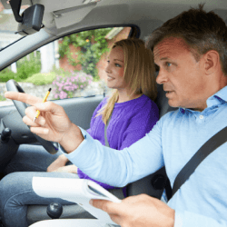 Driving instructor during a lesson with a pupil