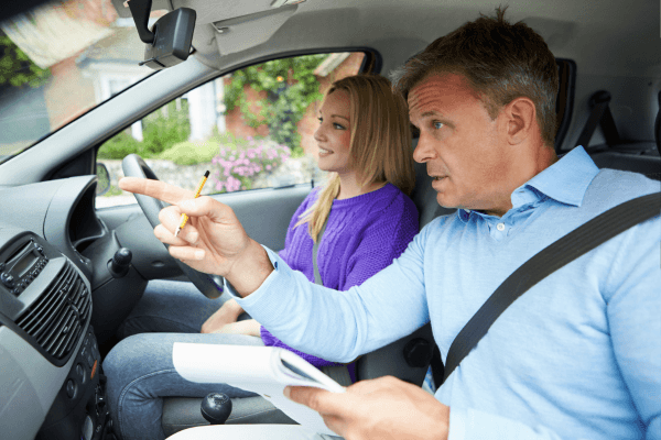 Driving instructor during a lesson with a pupil