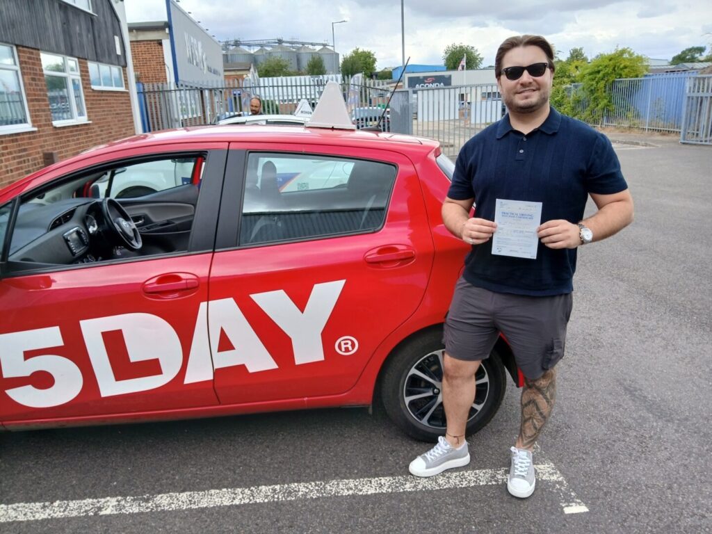 5Day Man Holding Certificate after Test Pass