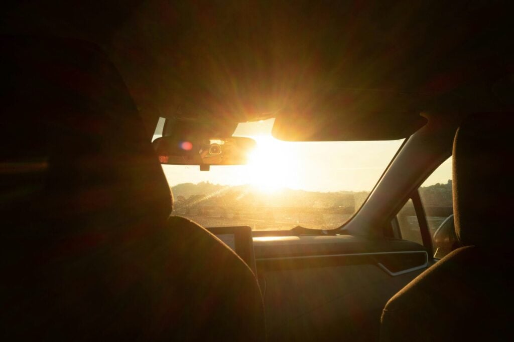 Bright, low sun coming through a car windscreen